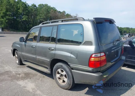 1999 Toyota Land Cruiser z USA, uszkodzony, nr VIN JT3HT05J5X0060043
